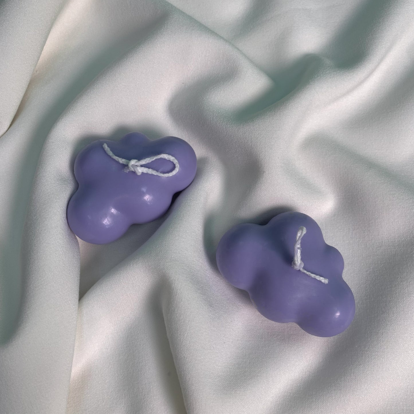cloud candle in lavender color, lightly scented with summerberries freesia